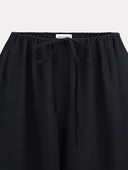 Black balloon trousers by MOSAÏKA waistband detail with drawstring
