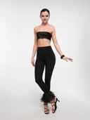 Black high-rise leggings by MOSAÏKA worn on model without trim