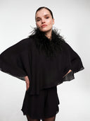 Feather boa collar by MOSAÏKA side view highlighting fluid feather texture and sculptural neckline