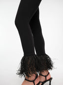 Black leggings by MOSAÏKA detail of raffia trim texture