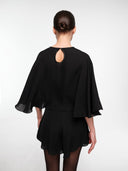 Black silk cape set by MOSAÏKA back angled view on model