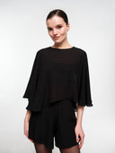 Black silk cape set by MOSAÏKA close-up front view on model