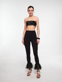 Black strapless crop top by MOSAÏKA worn on model minimal clean silhouette