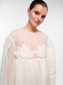 Off-white water lily dress by MOSAÏKA close-up of petal appliqué bodice