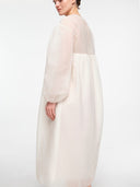 Off-white water lily dress by MOSAÏKA side view on model
