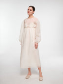 Off-white water lily dress by MOSAÏKA worn on model three quarter view